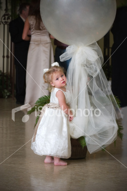 istockphoto_4455822-cute-barefoot-child-wearing-white-dress-holding-balloon-decoration.jpg